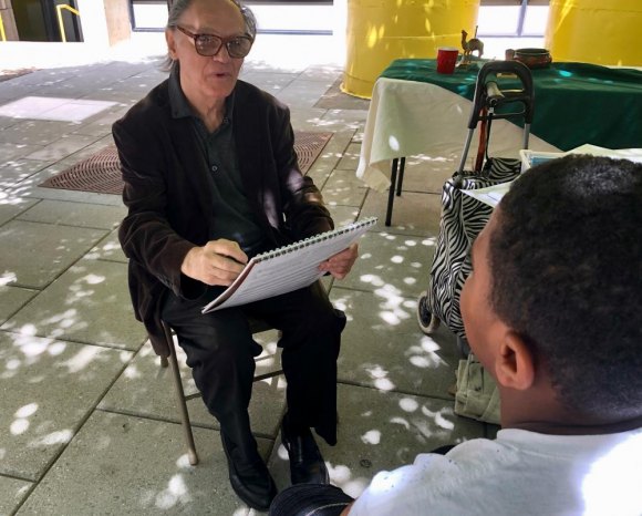 Roosevelt Island Day in Pictures, 2019 In dappled shade outside Gallery RIVAA, famed abstract painter Valeriu Boborelu took time to sketch kids.